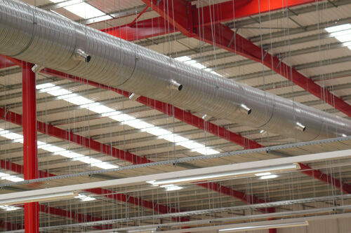Distribution centre HVAC system showing ductwork and nozzles